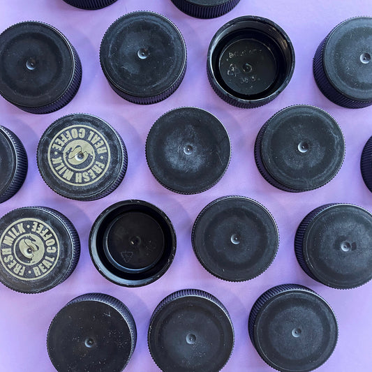 Upcycled black plastic bottle caps