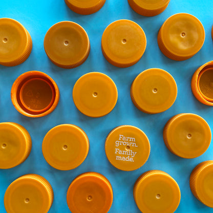 Recycled orange juice bottle caps