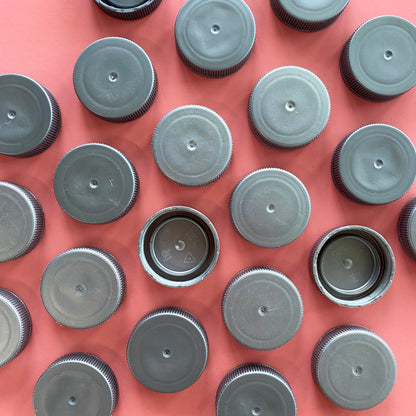 Silver plastic bottle caps flake
